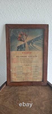 Ancienne affiche publicitaire Pile Wonder Tarif éclairage TSF encadrée