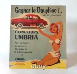 Carton Pub Huile Solaire Umbria Gagnez la Renault Dauphine 1956 Pin up